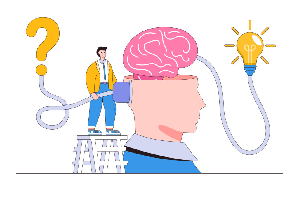 Aus einem großen Kopf quillt ein Gehirn. Hinter dem Kopf steht ein Mann auf einer Leiter, der ein Stromkabel in den Kopf steckt. Dieses Kabel tritt aus dem anderen Ende des  Gehirns aus und bringt eine Glühbirne zum Leuchten.